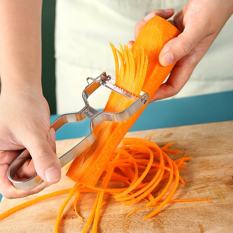 db879c2a-6f51-4888-a8cc-5fb392baee7b.jpg Simple And Portable Home Kitchen Fruit Peeler - Image 1